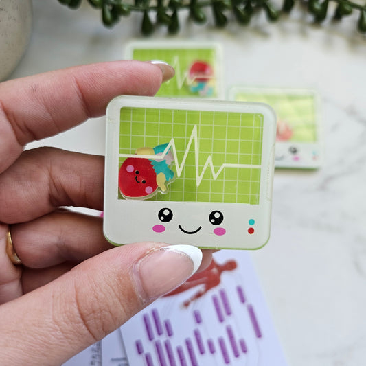 ECG shaker badge reel